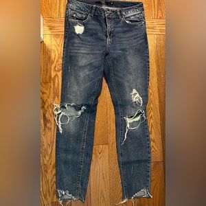 Dark wash ripped stretchy skinny jeans